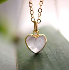 Looking for a unique accessory for some self love, or love for that special someone? Crafted from 14k gold filled and natural Rose Quartz, this pendant is the perfect, sparkling way to show anyone how much you care. Rose Quartz is a stone of love. It is believed to restore trust & harmony in relationships and encourage unconditional love. It purifies the heart and promotes self love, inner healing, and friendship. It is an alternate birthstone for January, as well as the spiritual birthstone for Minimalist Gemstone Jewelry For Valentine's Day, Rose Gold Jewelry With Rose Quartz For Gift, Delicate Jewelry With Heart Charm For Mom, Rose Gold Rose Quartz Jewelry Gift, Delicate Heart Charm Jewelry For Mom, Rose Quartz Pendant Jewelry Gift, Rose Gold Rose Quartz Jewelry Perfect For Gifts, Handmade Rose Gold Heart Pendant Jewelry, Delicate Heart Charm Jewelry As Gift For Mom