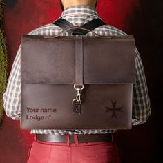 Elevate your Masonic attire with our Order Of Malta Briefcase, meticulously crafted from genuine cow leather for timeless elegance and durability. This versatile bag seamlessly transforms from a traditional briefcase to a convenient shoulder bag or backpack within minutes, offering unparalleled versatility for your needs. Featuring a convertible design, it provides effortless transitions between different carrying styles, ensuring comfort and convenience on the go. Whether you're heading to a me Convertible Bags, Laptop Bags, Malta, Laser Engraved, Laptop Bag, Cow Leather, The Go, Timeless Elegance, Convertible