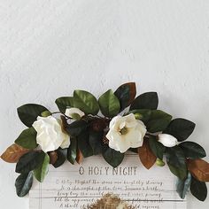 <p>Drape this realistic <strong>Southern Magnolia Swag</strong> over the window or over a doorway as the perfect swag decor for your farmhouse home. The lush life-like magnolia blossoms offer a bit of nature to your home decor. This beautiful faux garland is about three feet long and will be a lovely addition to your home decorating.</p> Magnolia Decor Ideas Living Room, Magnolia Wedding Theme Color Palettes, Floral Swags Decor, Magnolia Baby Shower Ideas, Magnolia Centerpiece Wedding, Magnolia Decor Ideas, Magnolia Wedding Theme, Savannah Decor, Magnolia Swag