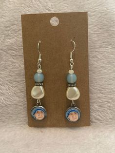 Mother Teresa Earrings. Choose from the drop down box which set you want.  Image taken from my original artwork. Handmade by me. Enjoy beautiful Catholic art jewelry bracelets with my original art or give them away as a great gift to inspire and delight.  Thanks for visiting my shop, if you need anything please don't hesitate to ask. Vintage Hypoallergenic Jewelry For Gift, Hypoallergenic Vintage Jewelry For Gift, Handmade Dangle Earrings For Mother's Day, Personalized Dangle Earrings For Gifts, Artistic Dangle Earrings For Pierced Ears, Adjustable Personalized Earrings As Gift, Personalized Adjustable Earrings For Gift, Handmade Teardrop Jewelry For Mother's Day, Adjustable Artistic Hypoallergenic Jewelry