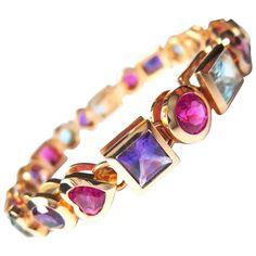 Thomas Leyser is renowned for his contemporary jewellery designs utilizing fine coloured gemstones and diamonds. This 18k rose gold bracelet with 20 multicoloured gemstones in top quality (Rubelites, Aquamarines, Amethysts), facetted in different shapes, 16,93cts., flexibel with a clasp + security snapper. 18k rose gold (37.02g) 20 multicoloured gemstones in top quality (Rubelites, Aquamarines, Amethysts - 16.39ct) Diamond Pendant Jewelry, Black Diamond Bracelet, Gold Tennis Bracelet, Multi Gemstone Bracelet, Multicolor Jewelry, Contemporary Jewelry Design, Bracelet Tennis, Gems Bracelet, Antique Bracelets