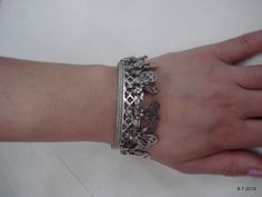 "Vintage Antique ethnic collectible very nice tribal old silver charm Bracelet or bangle pair from Rajasthan India. Worn by Banjara tribal people of Rajasthan. Beautiful workmanship all over the piece, adorn with silver charms. One quarter-hinged part can be open by pin. Original old pair in good condition with great antique look. great pair for jeweley collection. Inner diameter across - 5.3 cm(2\") Inner circumference -16.6 cm (6.5\") width include charms - 2.6 cm(1\") weight for pair - 92.5 g Silver Metal Bohemian Cuff Bracelet, Silver Bohemian Metal Cuff Bracelet, Bohemian Silver Metal Cuff Bracelet, Bohemian Silver Metal Bangle, Bohemian Antique Silver Metal Bangle, Bohemian Silver Cuff Bracelet, Bohemian Oxidized Silver Cuff Bracelet, Bohemian Metal Bangle Nickel-free, Silver Oxidized Bangle For Festival