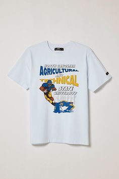 a white t - shirt with the words agricultural technical printed on it and an image of a man riding a skateboard