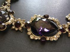 "Featuring clear/pink rhinestones crystals and purple glass stones and linked to cable chain. Just elegant and romantic!! Color: antiqued brass with clear/pink rhinestones crystals and purple glass stones Size: necklace measures around 21\" long x 1.15\" width x 2.5 center drop ** Please note we need to take around 5 days to make it. Please be patient. ** Item ship out with tracking number to you (around 10 to 14 business days for delivery). We also provide fast shipping service, around 3-4 busi Purple Stone Necklace, Amethyst Crystal Necklace, Necklace Birthstone, Necklace Amethyst, Necklace Purple, Necklace Wedding, Jewelry Bridal, Amethyst Jewelry, Purple Stones