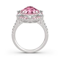 With grace and shimmer, this sparkling ring is a classic style that complements her sophisticated taste. Crafted in sterling silver, it features a brilliant pink stone wrapped in double halo frames of pink and white stones,bringing out its beauty and sparkle. Glamorous and classic, this exceptional ring will forever express your eternal love and undying commitment.Carat Weight: 6.05 ctStone Size: 9*13 mmStone Type: Jeulia® StoneNumber of Stones: 1 Stone Color: Fancy PinkStone Shape: PearCarat Weight: 2.051 ctStone Size: 2.5,1.7,1.3,1 mmStone Type: Jeulia® StoneNumber of Stones: 76 Stone Color: Diamond White, Fancy PinkStone Shape: RoundWeight: 6.84 gWidth: 22.55 mmHeight: 7.7 mmThickness: 2.95 mmMaterial: 925 SilverPlating Color: Silver Luxury Pink Sterling Silver Rings, Dazzling Pink Sterling Silver Ring, Formal Pink Cluster Ring With Brilliant Cut, Classic Pink Cluster Ring For Formal Occasions, Pink Diamond Ring With Halo Setting For Formal Events, Pink Diamond Ring With Halo Setting For Formal Occasions, Formal Pink Sterling Silver Diamond Ring, Classic Pink Cluster Ring With Prong Setting, Luxury Pink Sterling Silver Diamond Ring