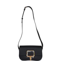 This Della Cavalleria Elan is of Black Epsom leather with gold hardware, features tonal stitching, rectangular shaped bag with curved base, gold half-bit clasp closure, a flat leather buckle shoulder/crossbody strap with one exterior back pocket. The interior is lined in Black swift leather and has one interior slip pocket on back wall.Collection: WOrigin: FranceCondition: New and never worn (plastic on hardware)Accompanied by: Hermes box, Hermes dustbag, felt, and carebookMeasurements: 9" width Hermes Birkin 25, Hermes Birkin 30, Hermes Box, Birkin 25, Madison Avenue, Leather Buckle, Hermes Bag, Hermes Birkin, Crossbody Strap