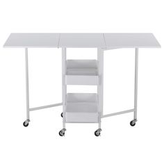 a white table with wheels and shelves on the bottom, in front of a white background