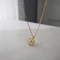 "Finding your path is a personal journey, a dance between self-discovery and the whispers of your heart, leading you to the destination only meant for you." Find your way in style with our Compass Necklace. This playful pendant necklace features a sparkling cubic zirconia center. The perfect accessory for any adventure, it adds a touch of whimsy to any outfit. -16" in length with 2" extender -stainless steel, gold plated Finding Your Path, Minimalistic Necklace, The Whispers, Find Your Way, Compass Necklace, Personal Journey, Minimalist Necklace, Everyday Jewelry, Self Discovery