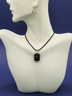 Discover the perfect blend of style and protection with our stunning obsidian collection. Start with an obsidian necklace, featuring the deep, mysterious allure of this powerful stone. Embrace the nostalgic vibe of a Y2K necklace, designed to make a bold statement. Our unisex obsidian jewelry pieces are versatile and stylish, suitable for any gender. Enhance your protection with a unique protection amulet or the elegant protection necklace. Pair these with a sleek black string necklace, offering Black Pendant Necklace For Formal Occasions, Black Obsidian Amulet Necklaces, Black Obsidian Amulet Necklace, Modern Black Necklace With Large Pendant, Handmade Modern Onyx Jewelry, Modern Black Oval Pendant Necklace, Silver Obsidian Pendant Necklace, Black Spiritual Crystal Necklace With Gemstone, Black Gemstone Crystal Necklace For Spiritual Use