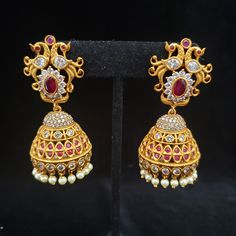 Pls Note Hair extension jewelry shown in 2 pics is just for display and not included in price. Handmade Indian Temple Jewelry, best to wear it for traditional ceremonies or Indian weddings. This bridal jewelry has an ethnic finish. It has very small Cubic Zircon stones. It is a Bollywood style one gram jewelry These Jhumka Earrings set has an excellent finish and gives out an exquisite sense of style. If you are looking for an amazing Fashion Jewelry set for special occasions such as Anniversary Wedding Jhumkas With Intricate Dangle Design, Wedding Dangle Jhumkas With Intricate Design, Temple Jewelry Style Bridal Dangle Earrings, Temple Jewelry Bridal Dangle Earrings, Temple Jewelry Chandelier Earrings For Wedding, Temple Jewelry Earrings For Diwali Celebration, Temple Jewelry Earrings For Ceremonial Diwali, Ceremonial Temple Jewelry Earrings For Diwali, Formal Temple Jewelry Earrings With Latkans