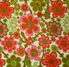 an image of a flowery fabric with red and green flowers on the bottom half