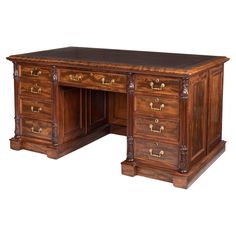 A William IV Mahogany Pedestal Desk Constructed from fine San Domingo mahogany, the desk raised on a plinth and two pedestal supports, each set with three drawers having brass handles and flanked by carved fluted pilasters, the frieze houses a large drawer flanked by two smaller ones above an open knee hole with a modesty panel, the corresponding side of the desk lined with leather book spines and a central drawer in conforming style; available cupboard space behind the pedestal drawers accessed from the panelled sides. English, circa 1840 Dimensions: H: 30 in / 76 cm W: 60 in / 153 cm D: 34 in / 86 cm San Domingo mahogany, a prized wood native to the Caribbean, has been highly sought after for centuries due to its durability, rich color, and ability to develop a beautiful patina over time Desk With Leather Top, Library Table Desk, Leather Top Desk, Chippendale Design, Campaign Desk, Book Spines, William Iv, Partners Desk, Desk Writing