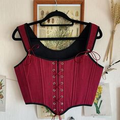 Reversible linen overbust corset, black & burgundy renaissance corset, Cosplay costume, victorian stays, 18th Century Inspired Corset Transform your wardrobe with this stunning reversible corset ♡ Adorned in burgundy linen and classic black linen on the other, this versatile piece offers double the style in one chic design. Featuring back lacing this corset ensures a perfect fit while adding an elegant touch to any ensemble.  ♡ Features♡ An accessory that evokes feelings of femininity, slenderne Medieval Underbust Corset Dress With Boned Bodice, Medieval Underbust Boned Bodice, Medieval Boned Underbust Bodice, Medieval Style Fitted Corset Belt With Corset Back, Black Fitted Medieval Corset Belt, Black Medieval Corset For Fantasy Events, Fitted Boned Bodice Corset For Fantasy Events, Medieval Black Corset For Fantasy Events, Red Overbust Bodice With Boning