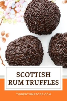 three chocolate truffles with sprinkles on top and the words scottish rum truffles above them