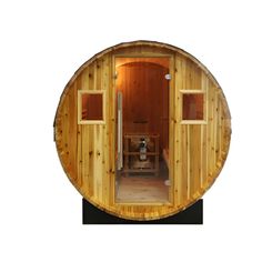 a wooden sauna is shown with the door open