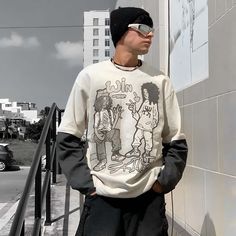 Our Casual Street Print Sweatshirt is perfect for those wanting to elevate their everyday wardrobe. Its timeless street print design and cotton blend fabric make this luxurious sweatshirt both comfortable and stylish. Crafted with attention to detail, this piece will bring a touch of sophistication to your off-duty wardrobe. Features: -100% Cotton -Crew neckline -Print design -Ribbed cuffs and hem -Unisex street style Oversized Graffiti Print Sweatshirt For Winter, Relaxed Fit Long Sleeve T-shirt For Streetwear, Urban Cotton T-shirt For Fall, Winter Streetwear Sweatshirt With Graffiti Print, Oversized Long Sleeve Graffiti Sweatshirt, Oversized Long Sleeve Graphic Sweater, Urban Long Sleeve T-shirt With Ribbed Cuffs, Oversized Casual Sweatshirt With Graffiti Print, Casual Crew Neck Hoodie For Streetwear