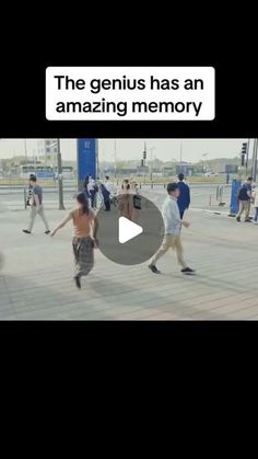 a group of people walking across a street next to each other