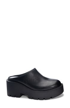 A chunky platform and lug sole modernize this clog outfitted with a padded footbed. 2 3/4" heel; 1 1/4" platform Synthetic upper, lining and sole Imported Modern Black Platform Slippers With Textured Sole, Casual Synthetic Clogs With Lug Sole, Black Clogs With Textured Sole For Spring, Black Platform Slippers With Leather Footbed And Round Toe, Black Platform Slippers With Leather Footbed, Black Chunky Platform Mules In Modern Style, Trendy Slip-on Clogs With Lug Sole, Black Clogs With Lug Sole And Round Toe, Spring Leather Clogs With Lug Sole