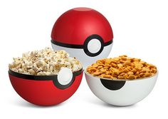 two pokeball bowls with popcorn and cereal in them