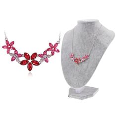 The Anna-Kaci Women's Floral Crystal Statement Necklace with Rhinestone Accents is a stunning piece designed for fashion-forward outfits and special occasions. This elegant necklace features a captivating floral design adorned with sparkling rhinestone accents, adding a touch of glamour and sophistication to any ensemble. The adjustable chain ensures a perfect fit for any neckline, making it versatile and easy to wear. Ideal for weddings, parties, or elevating your everyday style, this statement Date Night Gifts, Fuchsia Flower, Two Flowers, Crystal Statement Necklace, Layered Chain Necklace, Trending Necklaces, Initial Pendant Necklace, Layered Chains, Floral Necklace