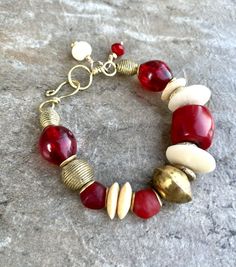 Boho Chic Bracelet Red Coral, African Tribal Brass, Red Resin Beads Bohemian Polished Red Coral Beads, Bohemian Red Coral Polished Beads, Bohemian Red Coral Beads For Jewelry Making, Handmade Bohemian Red Coral Beads, Red Hand Wrapped Beaded Bracelets For Beach, Bohemian Bangle Bracelet With Polished Beads, Bohemian Red Beaded Bracelets For Beach, Red Hand Wrapped Beaded Bracelet For Beach, Red Hand-wrapped Beaded Bracelet For The Beach