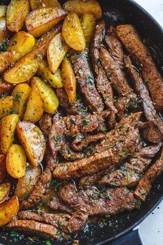 garlic butter steak and potatoes skillet with text overlay