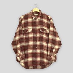 Vintage 90s Adamson Plaid Shadow Checkered Flannel Shirt Large Japanese Tartan Checked Shirt Japan Flannel Acrylic Work Button Shirt Size L Good Used Condition. No Stains and No Holes. Size (On Tag) : Size L **To make sure if it FITS YOU, refer at the exact measurements. Size Measurement (All measurements were taken lying flat) : Width [armpit to armpit] : 22.5 inches / 57 cm Length [shoulder to end of garment] : 31 inches / 79 cm THIS IS USED CLOTHING! PLEASE DON`T EXPECTED IT TO BE LIKE NEW OR Classic Brown Shirt For Winter, Classic Brown Flannel Shirt With Button Closure, Classic Brown Button-up Flannel Shirt, Classic Flannel Shirt With Snap Buttons, Classic Brown Flannel Shirt With Buttons, Brown Spread Collar Shirt For Winter, Vintage Brown Cotton Flannel Shirt, Classic Brown Flannel Top, Vintage Collared Tops For Winter