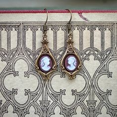 Lady Cameo Earrings- Pick a Color | Ragtrader Vintage Classic Brass Jewelry For Jewelry Making, Classic Antique Gold Metal Jewelry, Vintage Formal Jewelry With French Hook, Bronze Antique Finish Dangle Earrings, Elegant Antique Finish Jewelry Gift, Elegant Antique Finish Bronze Jewelry, Antique Brass Drop Earrings, Antique Finish Brass Drop Earrings, Bronze Antique Finish Drop Earrings