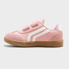 Add some throwback vibes to your little one's shoe wardrobe with these Dakota Retro Court Sneakers from Cat & Jack™. These closed-toe sneakers boast a faux-leather upper, round toe, and soft polyester mesh fabric insole and lining. Enhanced with a double-strap front with hook-and-loop fastening, the shoes lend an adjustable fit to keep your toddler comfortable all day. Cat & Jack™: Designed for all children so you can trust it's made for yours. Spring Skate Shoes For School With Round Toe, School Skate Shoes For Spring With Round Toe, Spring Round Toe Skate Shoes For School, Spring Low-top Skate Shoes For School, Pink Scratch-resistant High-top Sneakers, Pink High-top Scratch-resistant Sneakers, Pink Sporty Synthetic Canvas Shoes, Pink Synthetic Sporty Canvas Shoes, Sporty Pink Synthetic Canvas Shoes