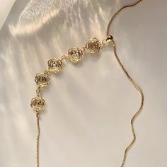 ✦ Adorn yourself with the beauty of nature with our Gold Plated Dainty Pearl Flower Adjustable Lariat Necklace. This stunning piece features a delicate gold flower charm suspended from an adjustable chain, allowing you to find the perfect length for your neckline. The intricate details of the flower charm add an elegant touch to any outfit, making it a versatile accessory for both casual and formal occasions. Treat yourself or surprise someone special with this charming and timeless piece of jew Adjustable Rose Gold Dainty Lariat Necklace, Adjustable Dainty Rose Gold Lariat Necklace, Dainty Adjustable Rose Gold Lariat Necklace, Delicate Adjustable Necklace With Flower Charm, Delicate Adjustable Necklace With Flower Pendant, Adjustable Rose Gold Lariat Necklace, Delicate Flower Pendant Necklace Adjustable, Adjustable Elegant Flower Necklace, Delicate Rose Gold Lariat Necklace With Clavicle Chain