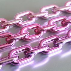 the chain is shiny and pink in color