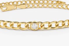 "Cuban Link Chain 14k Solid Gold / 3MM Cuban Curb Link Chain Bracelet with Bezel Setting Solitaire Diamonds by Ferkos Fine jewelry Item Details THREE STONES ✔ Made to Order ✔ Gold Kt: 14K Gold ✔ Width of Link: 3MM ✔ Round Diamond: 3 pcs 2.6MM ✔ Total CTW: 0.21 Ctw ✔ Diamond Color-Clarity: G Color Si Clarity ✔ Ready to Ship in 7-10 Business Days FIVE STONES ✔ Made to Order ✔ Gold Kt: 14K Gold ✔ Width of Link: 3MM ✔ Round Diamond: 5 pcs 2.6MM ✔ Total CTW: 0.35 Ctw ✔ Diamond Color-Clarity: G Color Classic Diamond Bracelet With Chain, Elegant Gold Chain Bracelet With Bezel Setting, Yellow Gold Bracelets With Cable Chain, Diamond Cable Chain Bracelet In Yellow Gold, Gold Diamond Chain Bracelet With Bezel Setting, 14k Yellow Gold Chain Bracelet With Bezel Setting, Yellow Gold Chain Bracelet With Bezel Setting, Classic Gold Chain Bracelet With Bezel Setting, Fine Jewelry Round Chain Bracelet