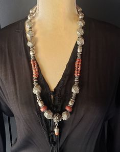 "Beautiful Antique Bawsani coral and silver necklace. Early 1920 century. with granulated Beads coral Dangled Bead Necklace from Yemen. Excellent quality of workmanship for this early 1920 century piece. with fine silver detail and a Beautiful Beads with Silver Dangles,unique piece from the earliest 1900s This is an example of the most delicate workmanship.item is individually handcrafted by local artisans in Yemen vintage item which may reflect signs of usage and wear. in very good condition Th Traditional Coral Necklace With Polished Beads, Traditional Coral Necklace With Gemstone Beads, Traditional Coral Necklace With Large Beads, Traditional Red Coral Necklace, Traditional Silver Necklaces With Gemstone Beads, Traditional Coral Jewelry With Large Beads, Traditional Orange Jewelry With Silver Beads, Silver Filigree Necklace For Rituals, Silver Filigree Necklaces For Rituals