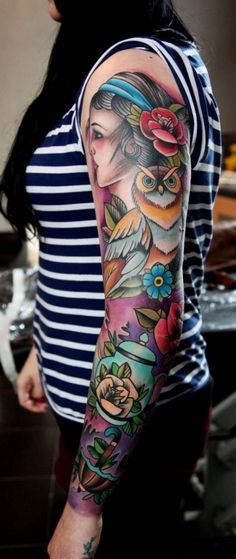 a woman with a colorful tattoo on her arm