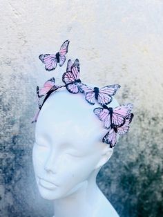 "Baby pink shade Monarch butterfly headpiece KIDS & ADULTS From our Whimsical Collection, this elegant monarch butterfly headband suitable to fit kids and adults features monarch butterflies on a headband I N C L U D E D Headband base topped with high quality intricately detailed butterflies. 3 or 7 Butterflies spread across the headband. 3 butterfly option is great for kids. The butterflies are 3.5\" in size. Headband fits kids age 7+ & adults. For toddlers and younger children, we will Pink Crown-shaped Headband For Party, Pink Adjustable Mini Hat For Costume Party, Pink Crown Headband For Party, Pink Whimsical Costume Hats For Carnival, Whimsical Pink Costume Hats And Headpieces For Carnival, Whimsical Pink Costume Hats For Carnival, Pink Mini Hat For Festivals, Handmade Pink Headband, Whimsical Pink Headband Fascinator