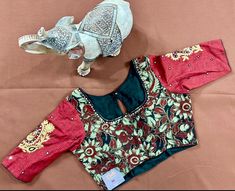 Cotton blouse with mirror work Festive Mirror Work Embroidered Top, Designer Long Sleeve Blouse With Mirror Work, Traditional Red Blouse With Sequins, Designer Mirror Work Blouse, Designer Tops With Mirror Work For Festivals, Designer Embellished Fitted Blouse, Designer Red Long Sleeve Blouse, Designer Long Sleeve Embellished Blouse, Designer Fitted Embellished Blouse