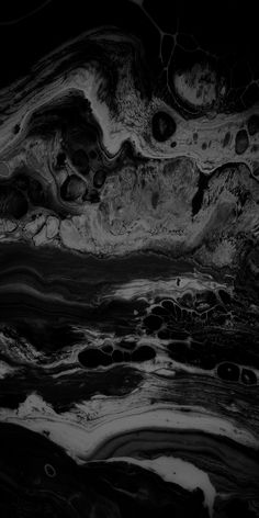 an abstract black and white painting with lots of bubbles in the water on top of it