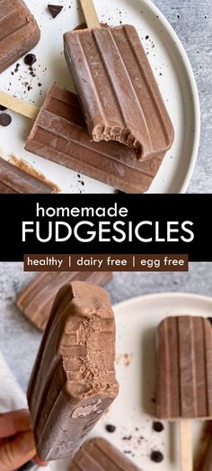 chocolate fudgesices on a white plate with two popsicles cut in half