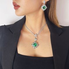 ✰ This gemstone necklace is perfect for people who want to achieve a brilliant and splendid look ✰ This green zircon necklace not only suitable for formal occasions such as banquets, weddings, theme parties, but also for everyday wear ✰ This green jewelry is a very special gift for birthday, Mother's Day, Valentine's Day and more  ✰ Comes with an exquisite gift box  We also offer the ring and earring from the same collection: https://www.etsy.com/listing/1217077278/green-emerald-cut-ring-vivid-green https://www.etsy.com/listing/1230999979/green-emerald-cut-earring-vivid-green Materials: Environmentally-friendly copper Quantity: 1 Piece with Chain Pendant Size: 1 x 1 x 0.51 in Main Gemstone: 0.6 x 0.6 x 0.2 in Necklace Length: 17.3 in ----♛ PRODUCTION & SHIPPING ♛ --- ✰Multiple items purcha Elegant Emerald Necklace With Jewels For Party, Elegant Emerald Necklace For Party, Elegant Emerald Necklace For Formal Occasion, Cubic Zirconia Necklace For Party, May Birthstone, Elegant Emerald Pendant Necklace With Clavicle Chain, Dazzling Cubic Zirconia Emerald Necklace For Formal Occasions, Elegant Crystal Emerald Necklace With Jewels, Elegant Pendant Jewelry Sets For Formal Occasions, Elegant Crystal Emerald Necklace For Party