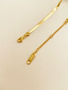 LONG LASTING AND DURABLE FREE SHIPPING ON ALL U.S ORDERS SAFE AND SECURE ONLINE SHOPPING MATERIALS: - Thick 18k gold layer on 925 sterling silver DETAILS: - Length: 16" - Width: 2.5mm - Weight: 5.5-5g CARING INSTRUCTION: **Sterling Silver is a very soft material which can be bent easily, a slight bend of the earring needle is considered normal** - Our jewelry are made of sterling silver. It is a metal that is very soft and tarnishes very easily. It is the natural characteristic of the metal. If Adjustable Gold-toned Sterling Silver Chain Necklace, Adjustable Sterling Silver Gold Chain Necklace, Gold Sterling Silver Chain Necklace With Adjustable Chain, Classic Gold Lariat Chain Necklace, Adjustable Gold Sterling Silver Chain Necklace, Gold Sterling Silver Box Chain Bracelet, Gold Delicate Chain Sterling Silver Necklace, Gold Delicate Chain Necklace In Sterling Silver, Formal Gold Sterling Silver Chain Necklace