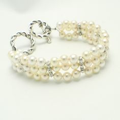 Cream Pearl Multi strand bracelet - Bridal - Formal - Holiday - Swarvoski Pearl - Wedding - Holiday Gift Elegant Oyster Cuff Bracelet, Elegant Beaded Cuff Bracelet As Gift, Elegant Pearl Bracelet For Party, Elegant Beaded Cuff Bracelet For Gift, Elegant Adjustable Bracelets For Anniversary, Elegant Adjustable Cuff Bracelet With Jubilee Design, Wedding Pearl White Beaded Bracelets, Double Strand Pearl Chain Jewelry For Weddings, Double Strand Pearl Chain For Wedding