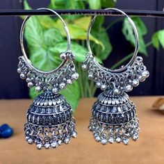 Perfect with ethnic & traditional wear. Fancy Party Wear Traditional Jhumki Earrings. Perfect gift for any occasion for yourself and your dear ones. It is advisable to store jewellery in a zip lock pouch (air tight pouch), keep away from water perfume and other chemicals and clean it with dry and soft cloth. Festive Metal Hoop Earrings In Temple Jewelry Style, Oxidized Finish Chandbali Hoop Earrings, Festive Oxidized Finish Hoop Earrings, Bohemian Tilla Dangle Earrings, Festive Round Hoop Earrings With Oxidized Finish, Bohemian Silver Bridal Earrings With Latkans, Bohemian Bridal Earrings With Latkans In Silver, Bohemian Bridal Silver Earrings With Latkans, Festive Bohemian Jhumkas