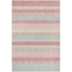 an area rug with multicolored stripes and dots