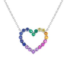 Beautiful in meaning and appearance, celebrate the colorful wonder of rainbows with this sterling silver necklace. This stunning necklace boasts a heart shaped stationary pendant that is lined with round gemstones in a rainbow of vibrant hues. The gemstones include created blue, yellow, and orange sapphire, amethyst, created ruby, and created emerald. This heart pendant measures 16mm in both length and width and is set on a cable chain that can be worn at 16 or 18 inches in length. Elegant Multicolor Heart Cut Jewelry, Multicolor Heart Charm Jewelry For Anniversary, Multicolor Heart Charm Necklace For Anniversary, Multicolor Gemstone Necklace For Anniversary, Multicolor Heart Cut Necklace Gift, Multicolor Round Necklace For Mother's Day, Multicolor Sterling Silver Birthstone Necklace, Sterling Silver Gemstone Heart Necklace, Elegant Multicolor Necklace With Heart Charm