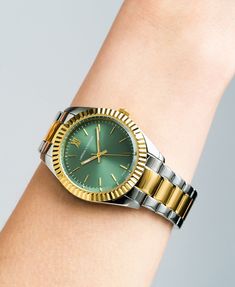 Paying homage to the bold woman in you that seeks adventure, and dares to be different, JADE was designed to inspire you to step out of your comfort zone: The chunky 36mm bezel frames an elegant green dial on a vibrant mixed gold stainless steel chain link strap. From festivals to fine dining: JADE is the perfect timeless show stopper for your wrist, transcending seasons and occasions. The only watch you’ll ever wear. Timeless Green Watch Accessories With Metal Dial, Everyday Green Quartz Watch, Green Watch With Metal Dial As Gift, Green Watch With Metal Dial For Gift, Trendy Green Watches As Gift, Timeless Show, Green Watch, Men's Vintage Watch, Out Of Your Comfort Zone