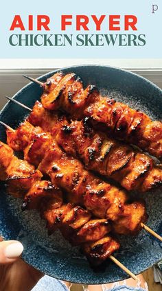 chicken skewers on a plate with the title air fryer chicken skewers