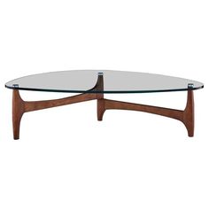 an oval glass coffee table with wooden legs