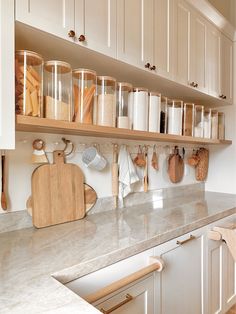 the kitchen counter is clean and ready to be used as a cook's pantry