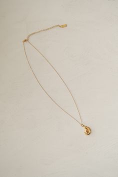 Our cove design on a delicate chain. The perfect classic necklace to add to your summer stack Materials & Specifications pendant size: .5 inch wide chain length: 16inch chain + 3 inch extender 14k Gold-filled Chain Necklace With Round Pendant, Gold Pendant Locket Necklace With Delicate Chain, Everyday Pendant Initial Necklace With Delicate Chain, Metal Cable Chain Long Necklace, Everyday Initial Pendant Necklace With Delicate Chain, Delicate Charm Necklace With Oval Pendant And Adjustable Chain, Delicate Charm Necklace With Oval Pendant, Everyday Pendant Charm Necklace With Delicate Chain, Minimalist Jewelry With Delicate Chain And Initial Pendant