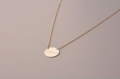 "Disc Necklace * The most special jewelry in Etsy, unique gift for you and your beloved ones. Disc necklaces are designed to show your passion and love to your loved ones with special memories. C U S T O M * D I S C * N E C K L A C E * Material: High quality 925 Sterling Silver plated in 14K Gold or 14K Solid Gold * Dimension: 14mm diameter * Finish: Gold, Rose Gold, White Gold F E A T U R E S * Made to Order * High Quality Material * Personalized * Packaged with Elegant Jewelry Box * Handmade a Gold Disk Necklace, Disk Necklace, Gold Disc Necklace, Gold Disc, Box Handmade, Disc Necklace, Special Jewelry, Circle Necklace, Necklace Personalized